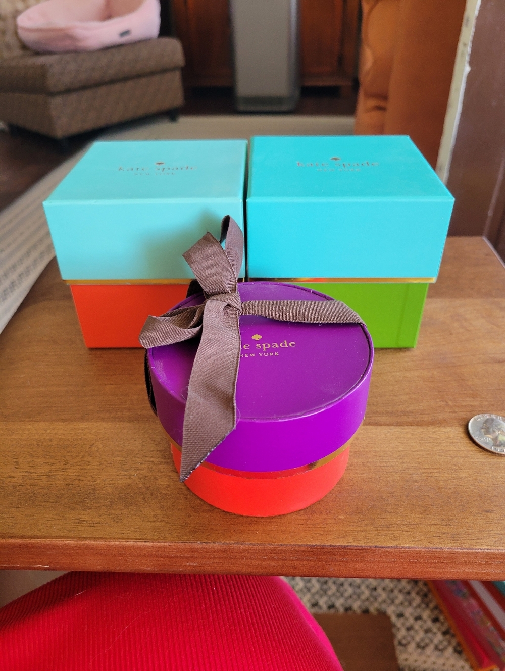 kate spade purple and red round gift box with brown ribbon And 2 Watch Boxes